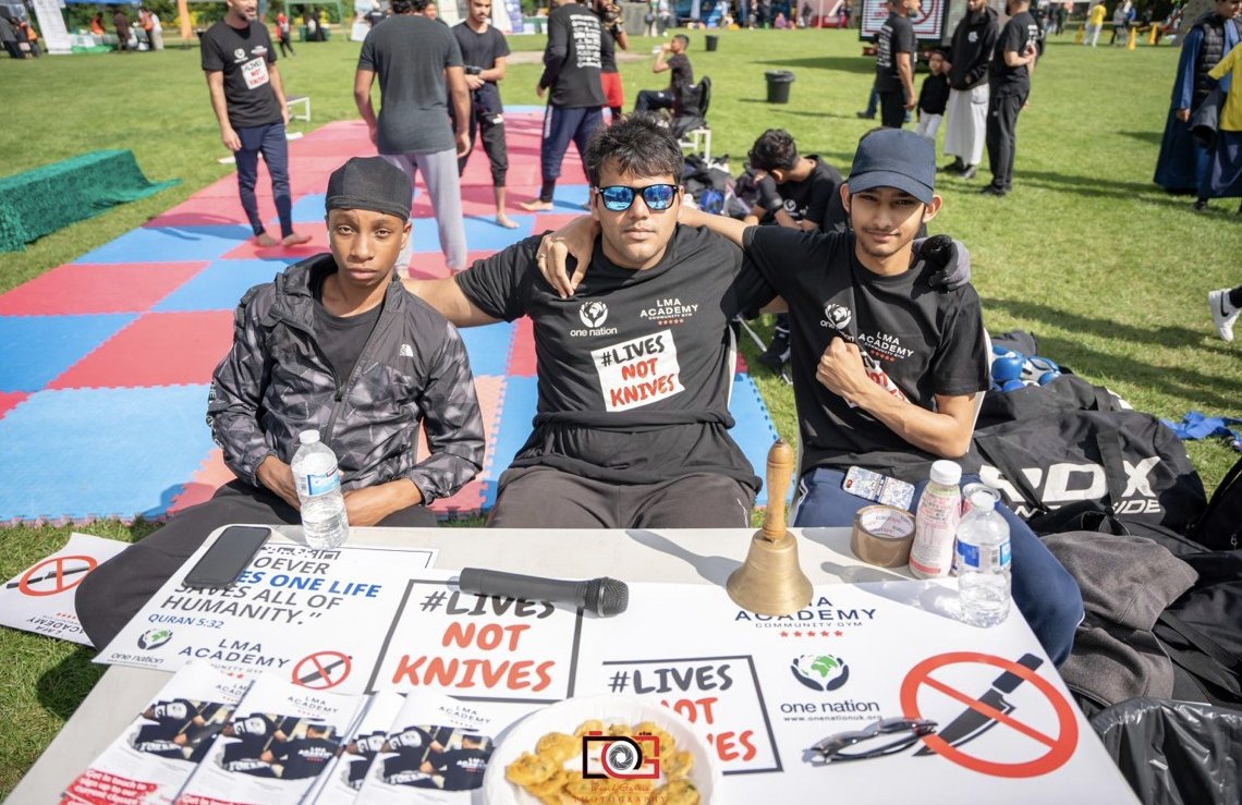 LMA Academy mentorship team at a Lives Not Knives stall
